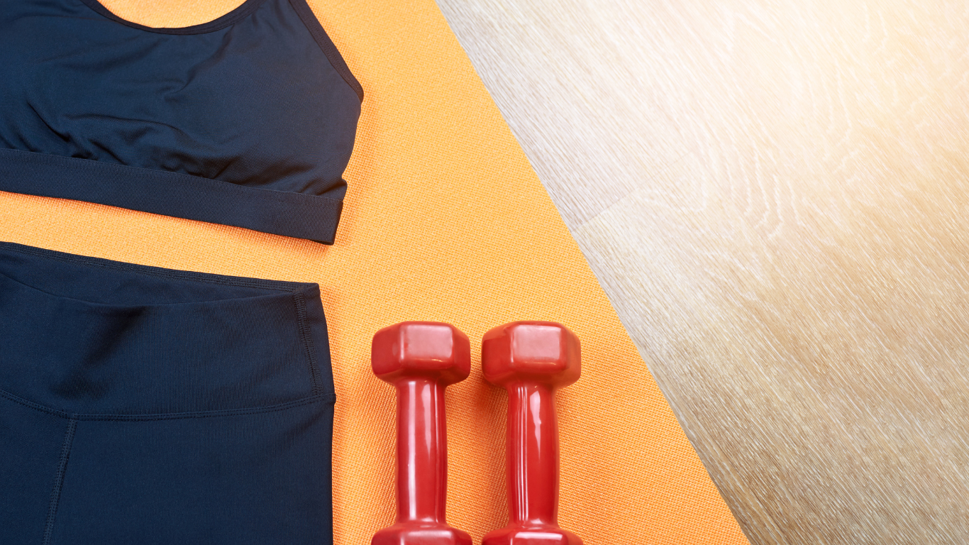 Dumbbells and yoga mat set up for strength training for women